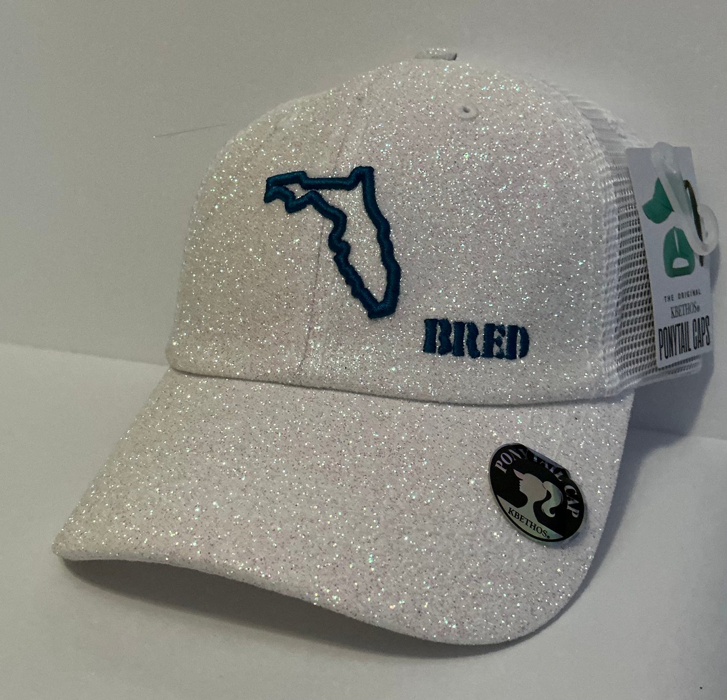 White Glitter Ponytail with Teal Logo