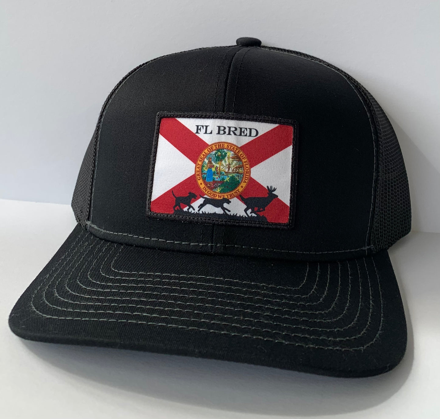 Black Trucker Hat w/ Deer Chase/Fl Seal