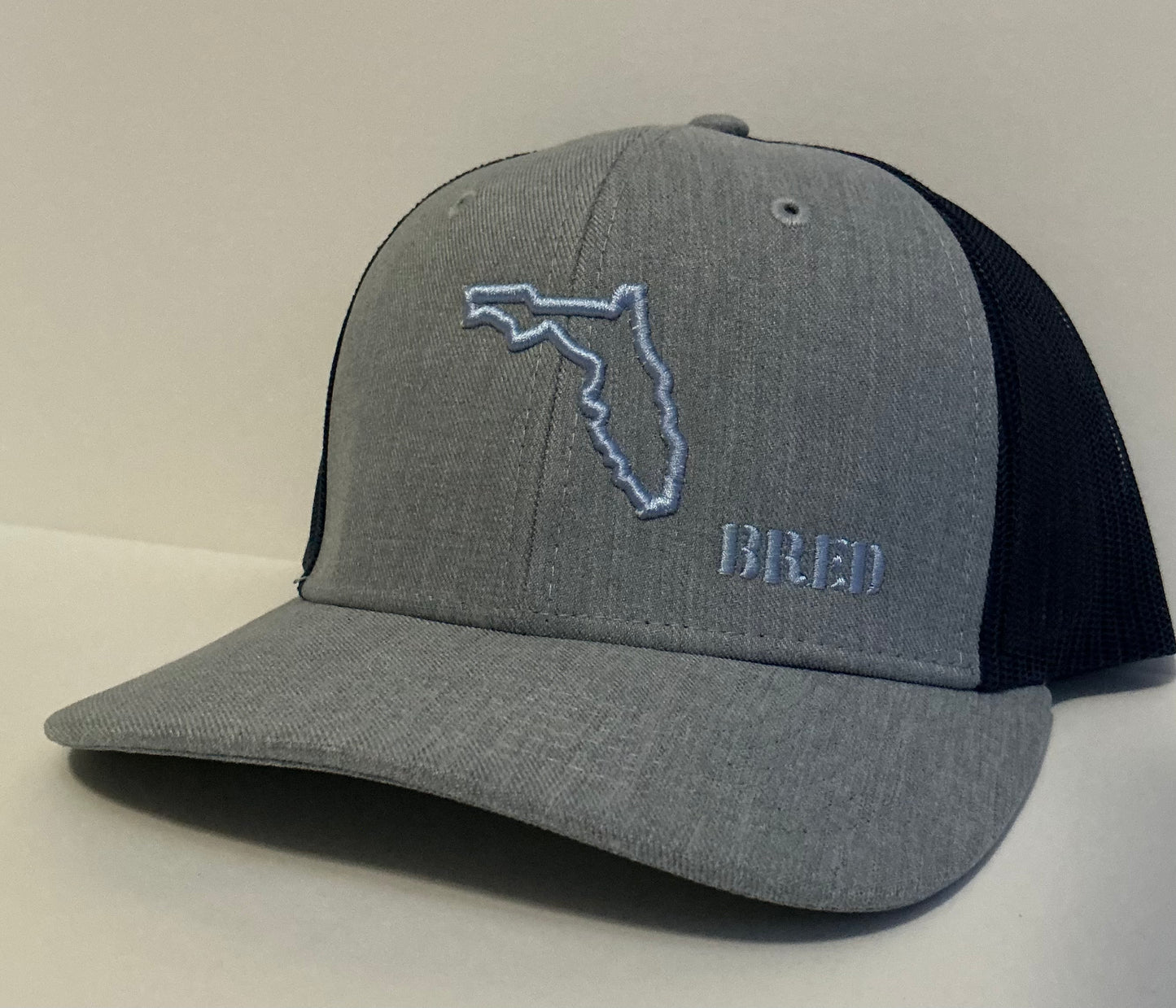 Heather Gray and Black Trucker w/ Light Blue Logo