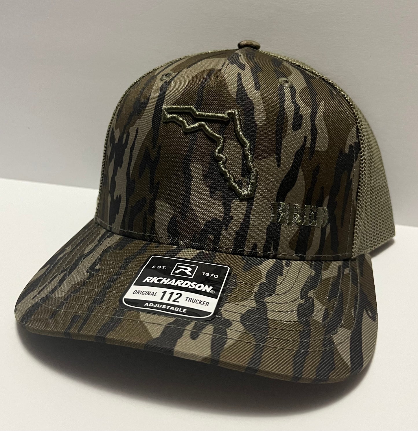 Bottomland Camo SnapBack w/ Green Logo